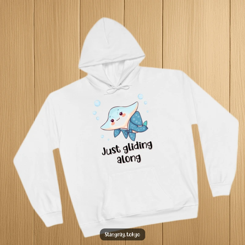 Funny hoodie with a stingray in a blue kimono playfully swimming through bubbly water, cozy and aquatic.